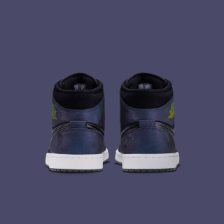 Men's Space Jam x Air Jordan 1 Mid "Black/Varsity Blue" (SKU: IX6374-001). Photo via Nike.