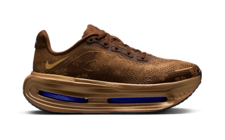 Nike Running's Vomero Premium in a "Black/Hot Lava/Anthracite/Sapphire" color scheme.