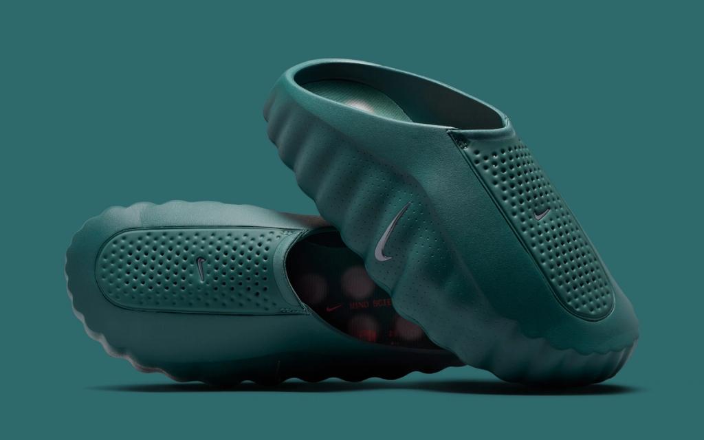 Nike Mind 001 in Mineral Slate colorway, showcasing the neutral gray upper and recovery-focused design