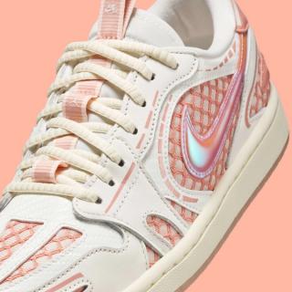 Close-up of the Air Jordan 1 Low MM V3 in a "Sail/Washed Coral" color scheme.