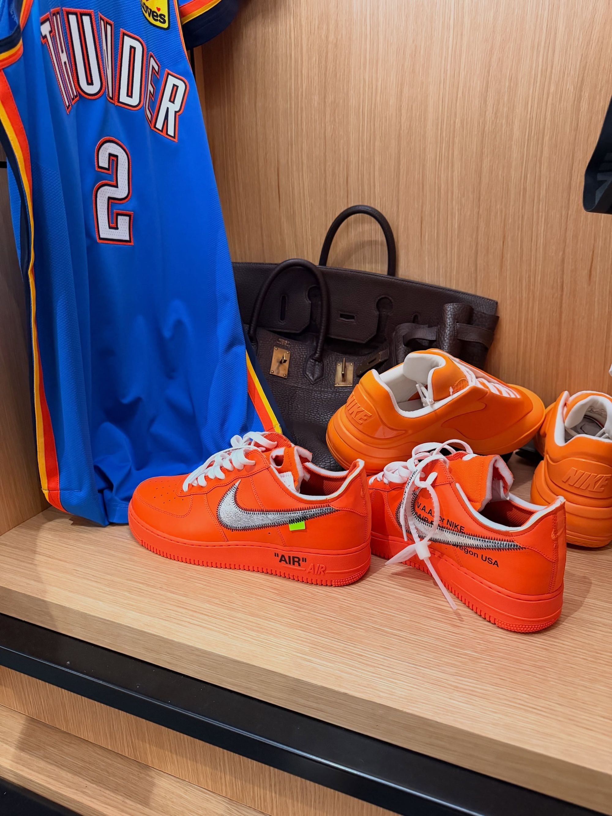 Nike SHAI 002 Basketball Shoe in orange.