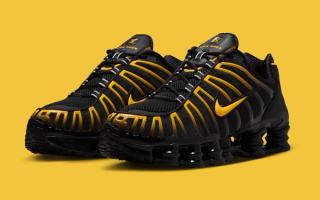 Nike Shox TL in a "Black/University Gold" color scheme.