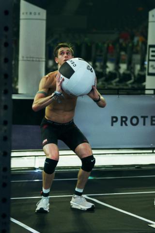 Dylan Scott performing wall balls while wearing a Nike Hybrid Fly Prototype in the 2026 HYROX World Champions. Photo via Nike.