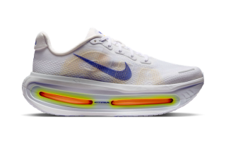 Nike Running's Vomero Premium in a "White/Orange" color scheme.