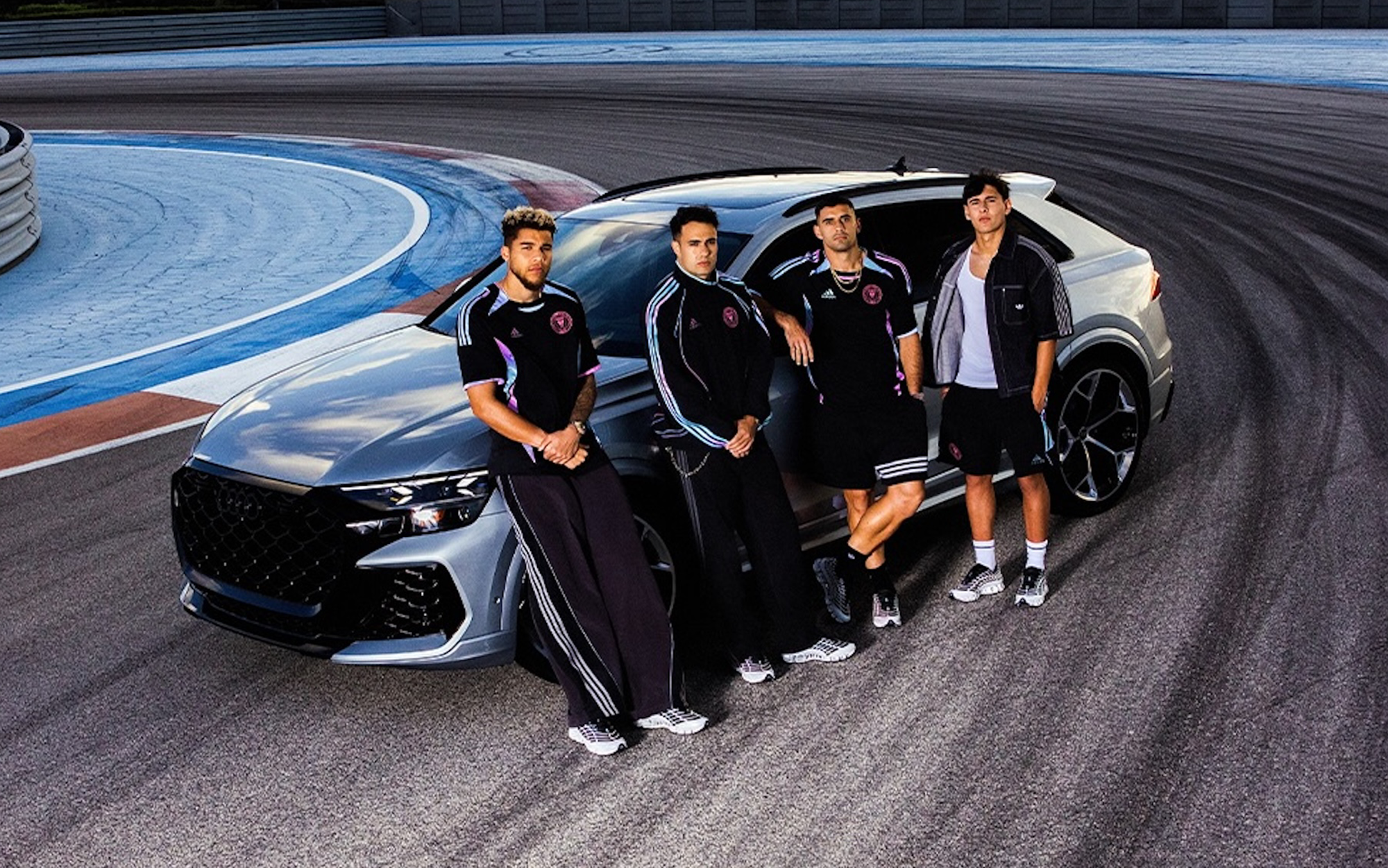Inter Miami players modeling collaboration editions of the adidas x Audi Revolut F1 Team "Miami" Collection, inspired by adidas Football's Teamgeist design popular during the 2000s.