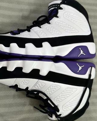 Air Jordan 9 in white, purple & black. Photo via X user @zSneakerHeadz.