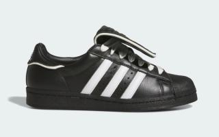 Avirex x adidas Superstar "Black/White" sneaker collaboration.