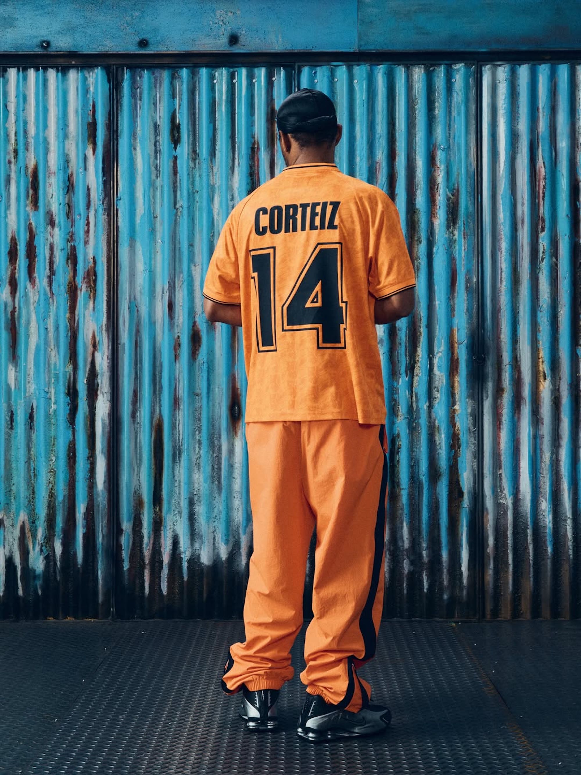 The Netherlands-inspired tracksuit & jersey combinations by Corteiz. Photo via Corteiz.