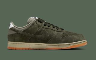 Medial angle of the Nike SB Dunk Low Pro B in a "Sequoia/Oil Green" color scheme.