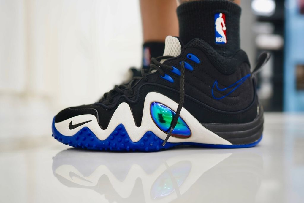 Nike Zoom Flight V in original Jason Kidd colorway, displaying the lightweight construction and responsive Zoom cushioning of the signature model