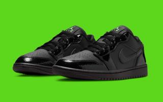 Women's Air Jordan 1 Low in a "Black/Black/Black/Scream Green" color scheme.
