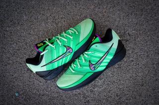 Cj1661-100 Mens nike Zapatillas Sb Bruin React "Gamer" basketball shoe in a "Green Shock" color scheme.