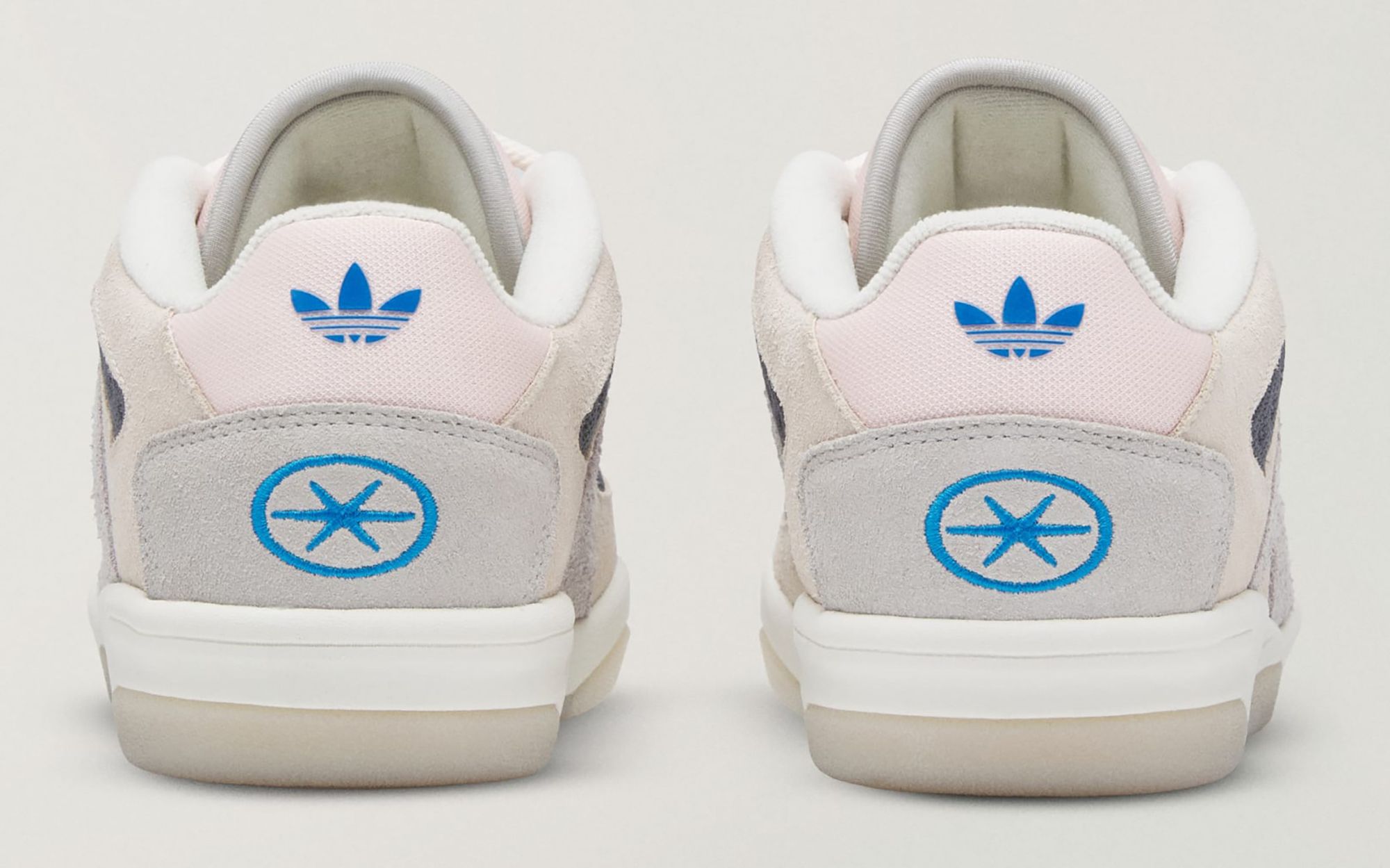 Bad Bunny x adidas BadBo 1.1 "White/Grey/Pink" (SKU: LC5466). Photo via adidas.