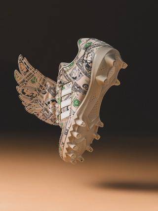 Jeremy Scott's adidas Forum Low Wings "Money" U.S. Football Cleats.