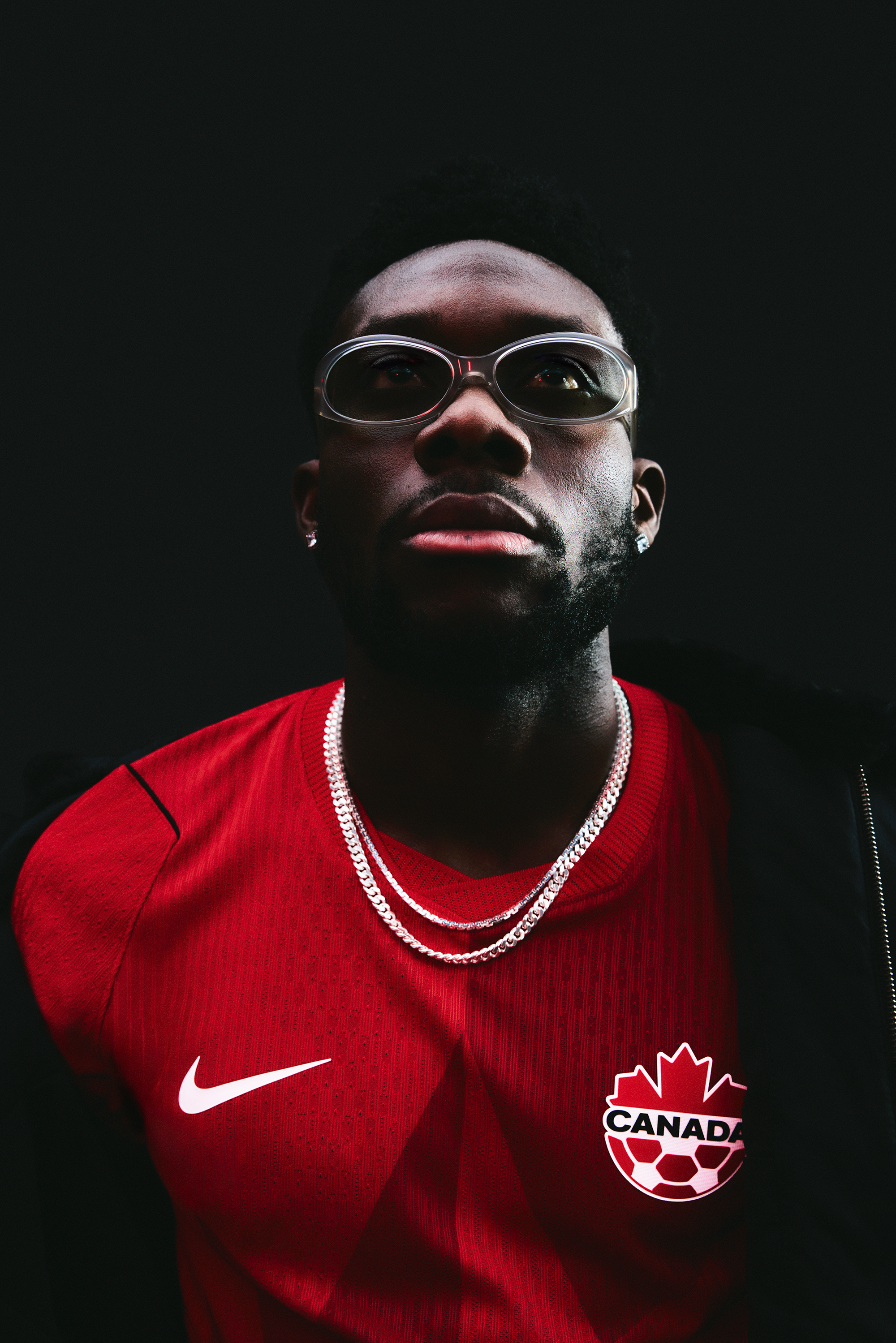 Alphonso Davies wearing the Canada '26 Home Jersey. Photo via Nike.