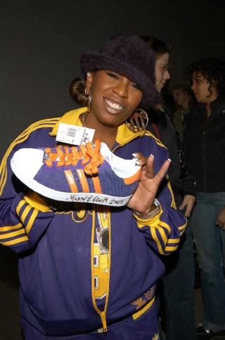 Missy Elliott holding her adidas Superstar Vintage "35th Anniversary" Collaboration. Photo by Patrick McMullan/Getty Images via Betsy Decker.