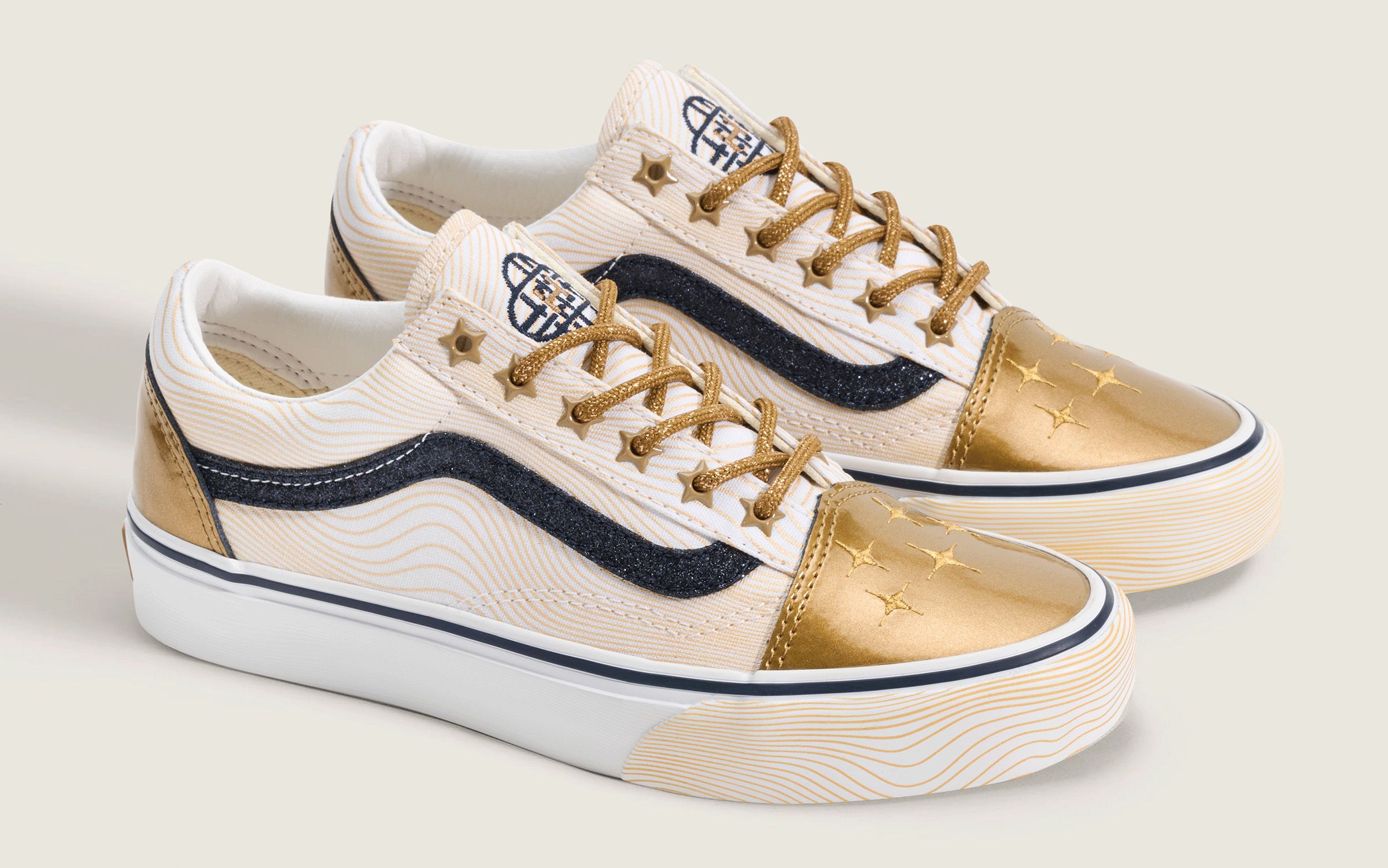 Big Kids' KPop Demon Hunters x Vans Old Skool "Golden" (SKU: VN000ECUGLD). Photo via Vans.