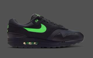 Medial angle of Nike's Air Max 1 in a "Black/Green Strike" color scheme.