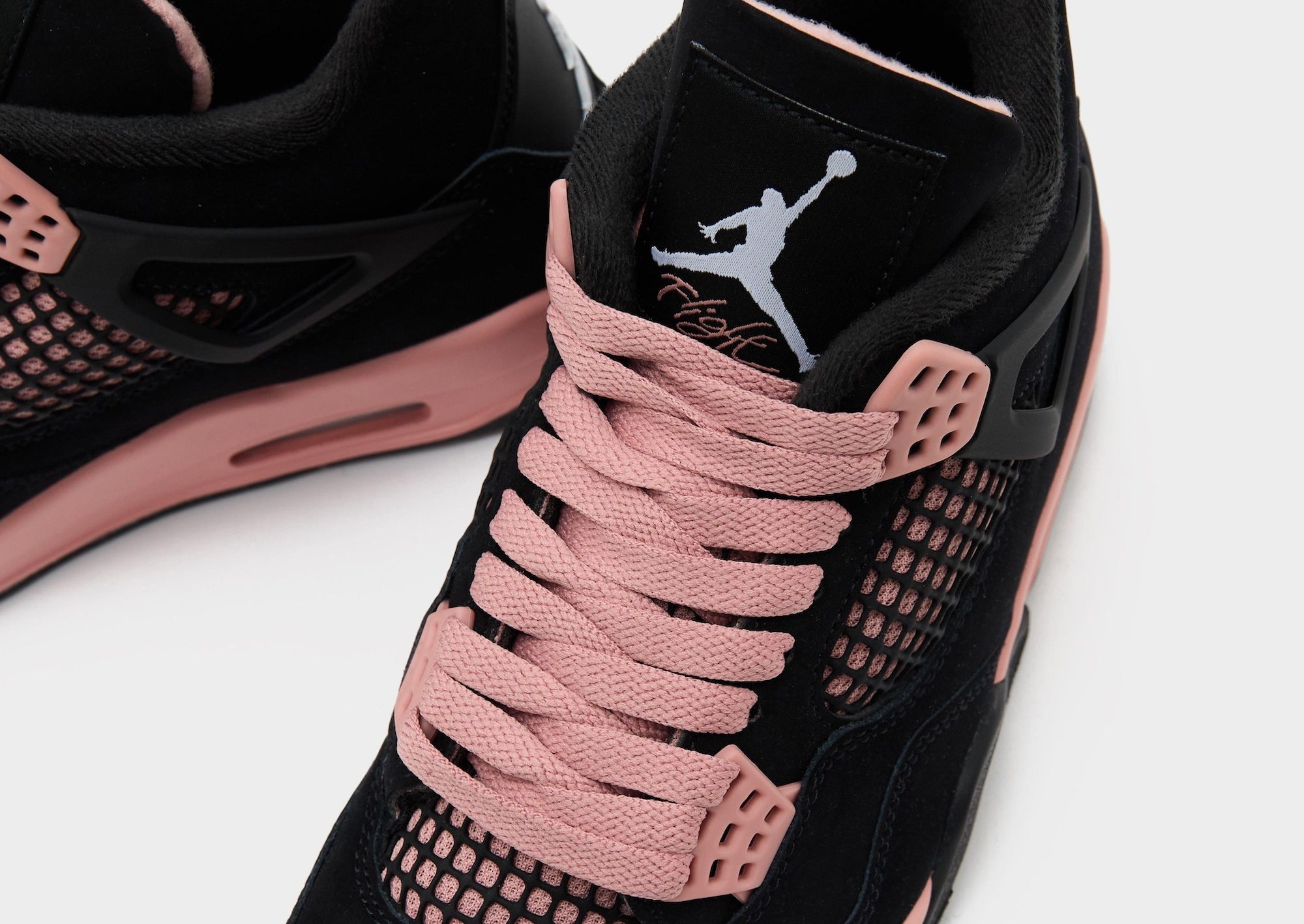 Women's Air Jordan 4 "Pink Thunder" (SKU: HV0823-001). Photo via JD Sports.