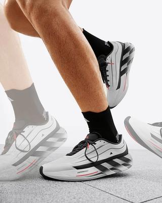adidas HyperBOOST Lite running shoe with hollowed-out, sculpted midsole reminiscent of On's shoes.