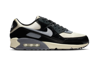 Nike Air Max 90 in a "Sail/Black/Anthracite/Light Smoke Grey" color scheme, complete with faux croc skin mudguards.