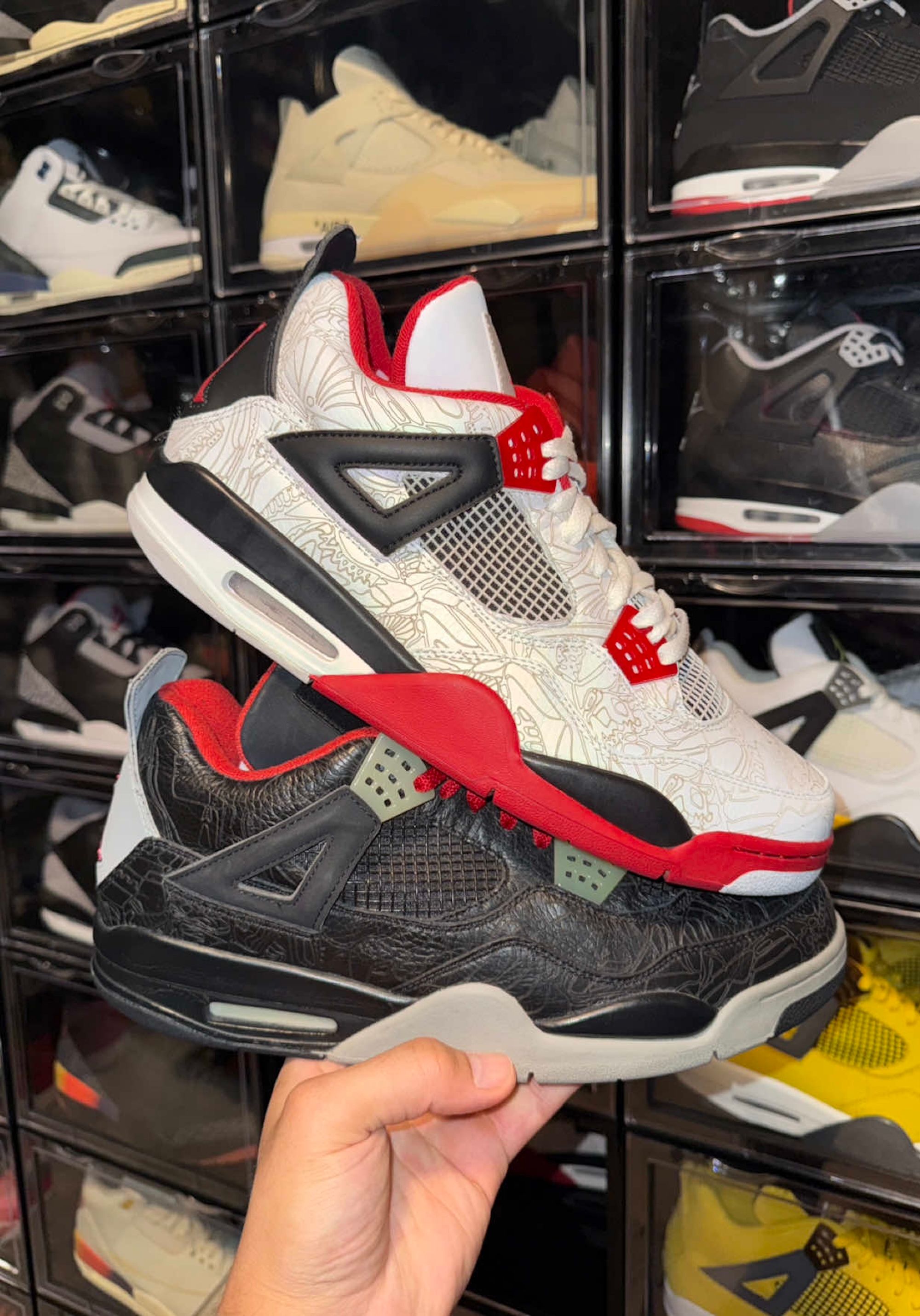 Original Air Jordan 4 "Laser" retros in white and black from 2005. Photo via @dj_sneakerhead on TikTok.