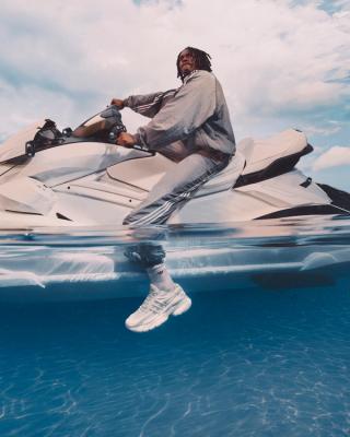 Campaign visual for Pharrell's "Triple White" VIRGINIA Adistar Jellyfish. Photo via adidas Originals.