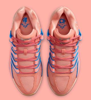 Top-down view of Kevin Durant's Nike KD 18 in an "Atomic Pink" color scheme.