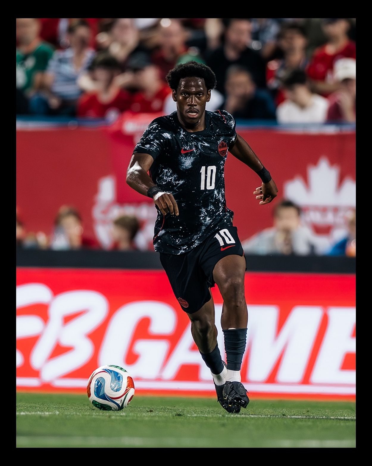 Jonathan David wearing adidas Predator 26 FT. Photo via Canada Soccer.