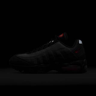 Photo of Nike's Air Max 95 in a "Black/Bright Crimson/Anthracite/Iron Grey" in the dark.