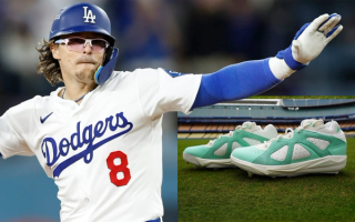 Kiké Hernández of the Los Angeles Dodgers with a mint-colored pair of the Bad Bunny x adidas BadBo 1.0 baseball cleats, debuted against the Boston Red Sox.