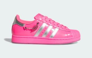 Adidas Superstar II "Lucid Pink/Silver" sneaker featuring kiss charms and graphics.