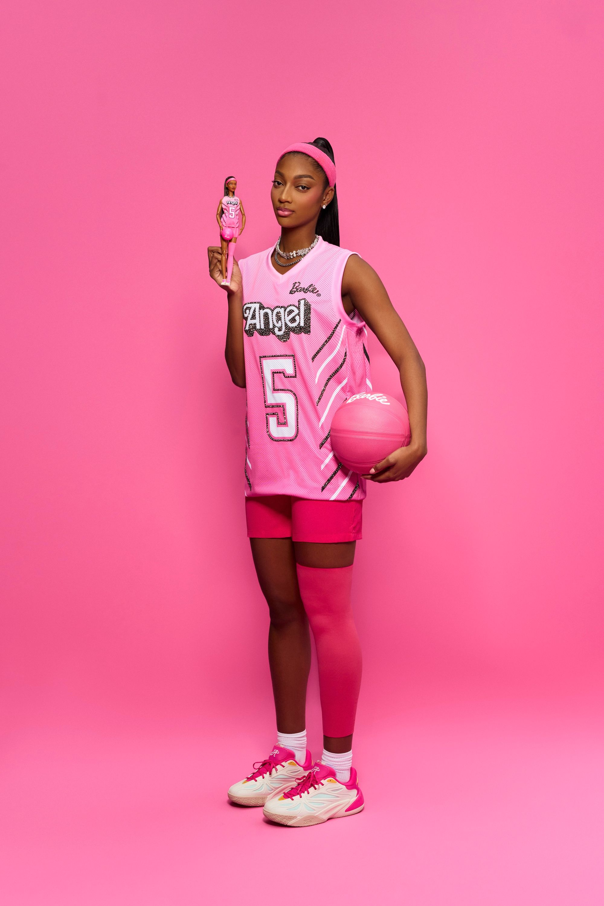 Angel Reese with her Barbie x Reebok Capsule. Photo by Jacob Webster via Reebok.