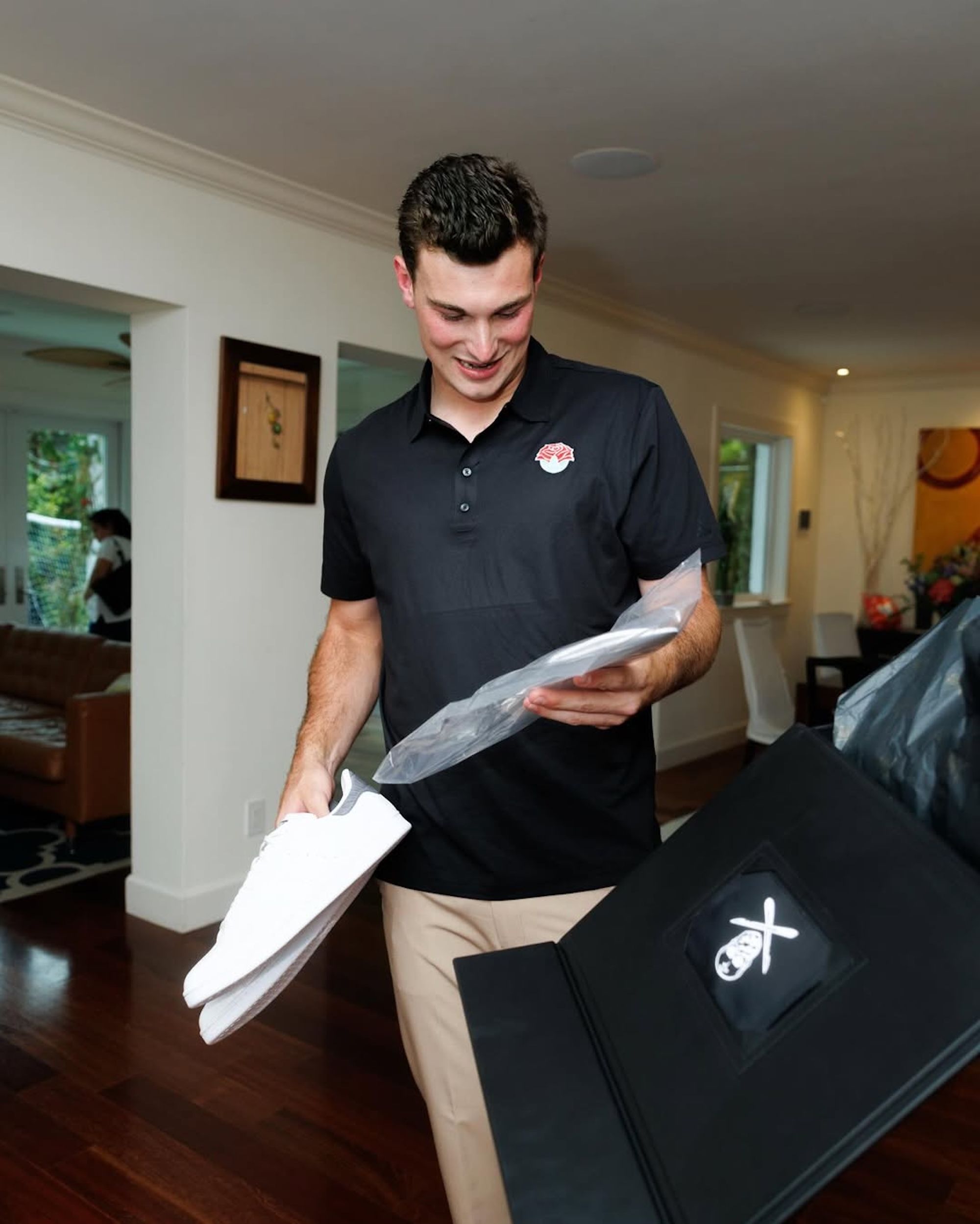 Fernando Mendoza with his custom adidas Stan Smith gift. Photo by @excelfootball via The Shoe Surgeon on Instagram.