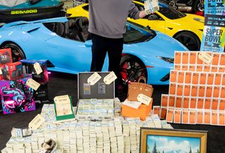 Mr. Beast in promotional material for his and Whatnot's $1 million giveaway, featuring a Lamborghini Spider 14, 100 iPhones, and much more.