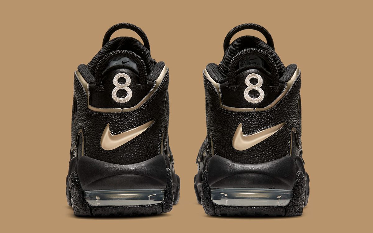 Nike uptempo black outlet gold