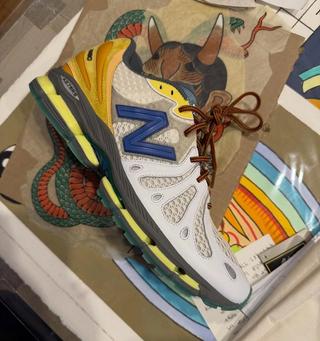 New Balance 1890 sneaker-moccasin in a yellow snakeskin makeover.