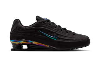 Women's Nike Shox Z in a "Black/Metallic Silver/Multi-Color" color scheme.