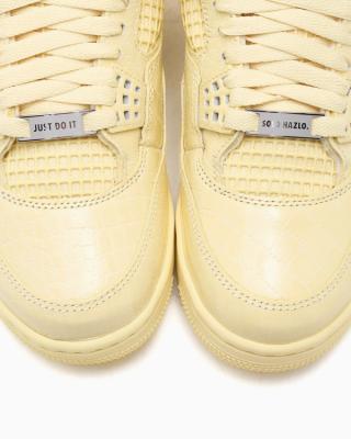 J Balvin x Air Jordan 4 "Lemonade" (SKU: IW2872-700). Photo via FOOTDISTRICT.
