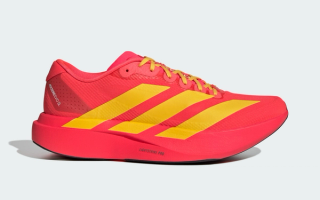 Adidas Adizero Evo SL running shoe in a " Lucid Red/Bold Gold/Semi Lucid Blue" seemingly inspired by Spain's National Football Team.