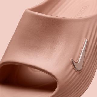 Close-up of the Women's Nike ReactX Rejuven8 Slide in a "Rose Gold" color scheme.