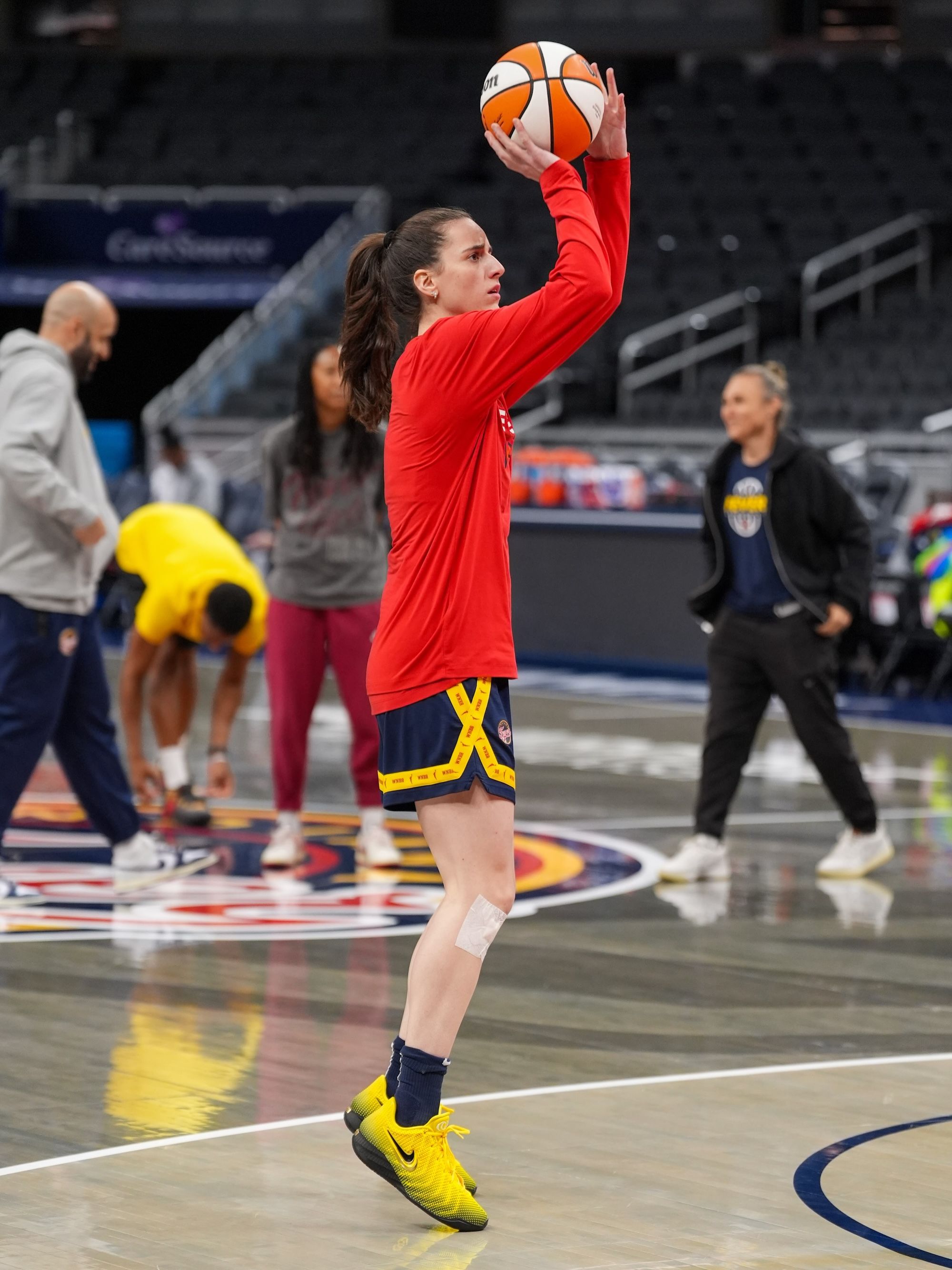 Caitlin Clark wearing Iowa Hawkeyes-inspired Nike Caitlin 1. Photo via Indiana Fever.
