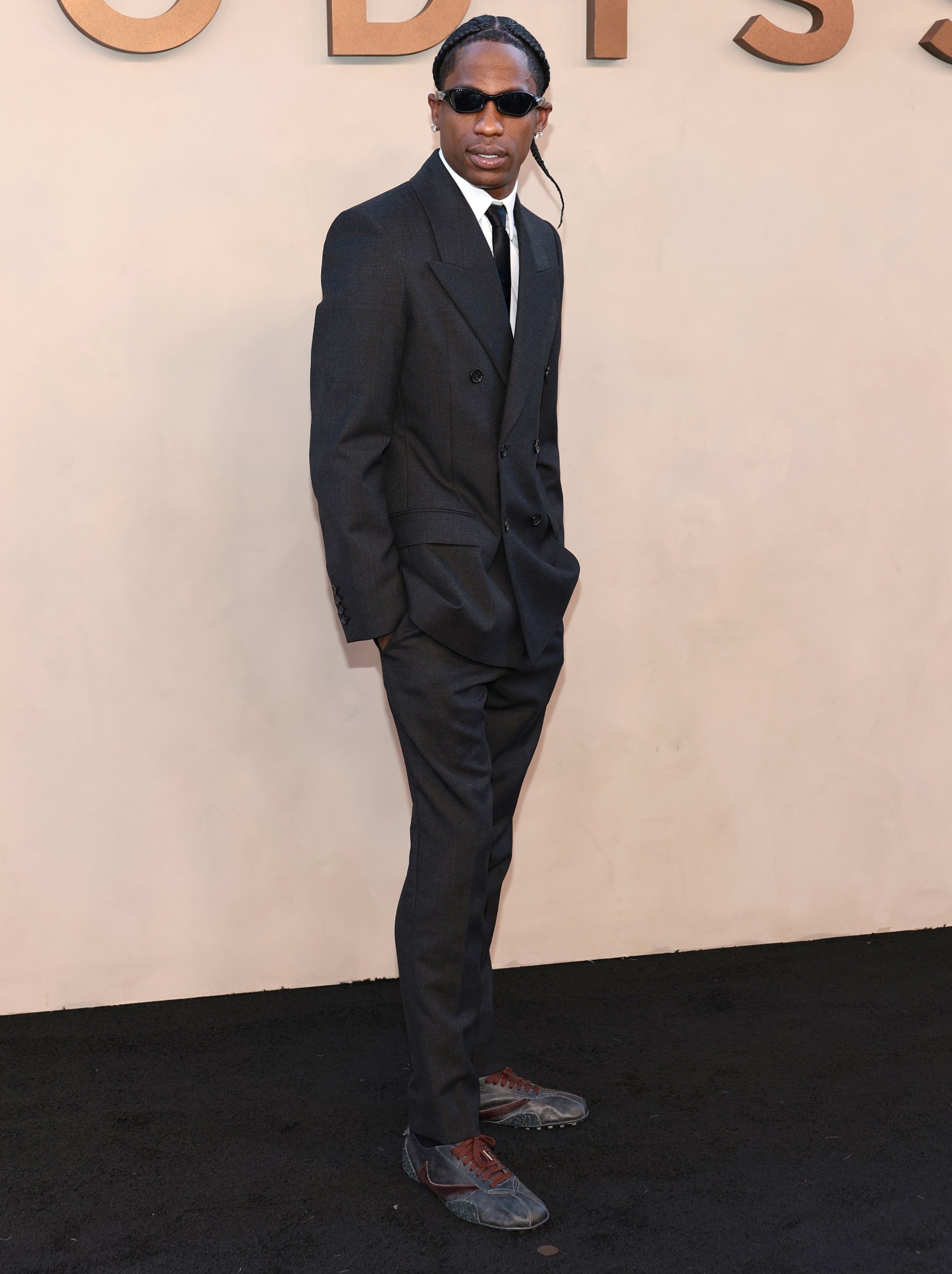 Travis Scott on the black carpet at The Odyssey premiere