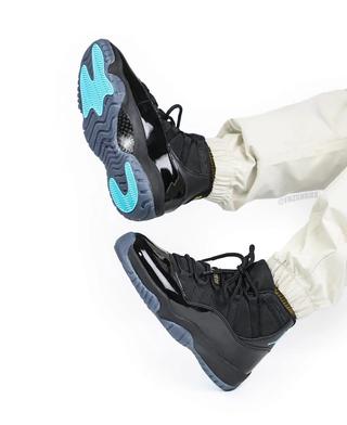 On-foot photo of the Air Jordan 11 "Gamma" 2025 retro.