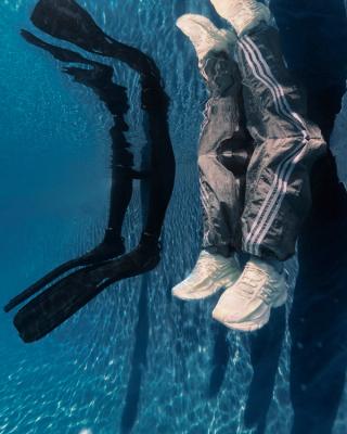Campaign visual for Pharrell's "Triple White" VIRGINIA Adistar Jellyfish. Photo via adidas Originals.