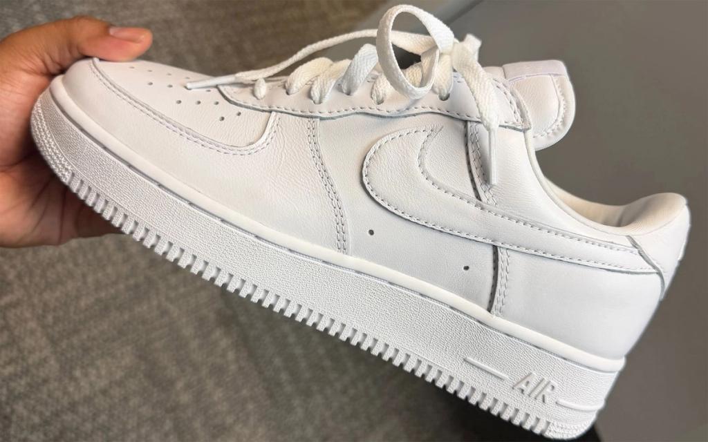 Nike Air Force 1 Low in 2001 construction with restored silhouette details and classic white leather upper