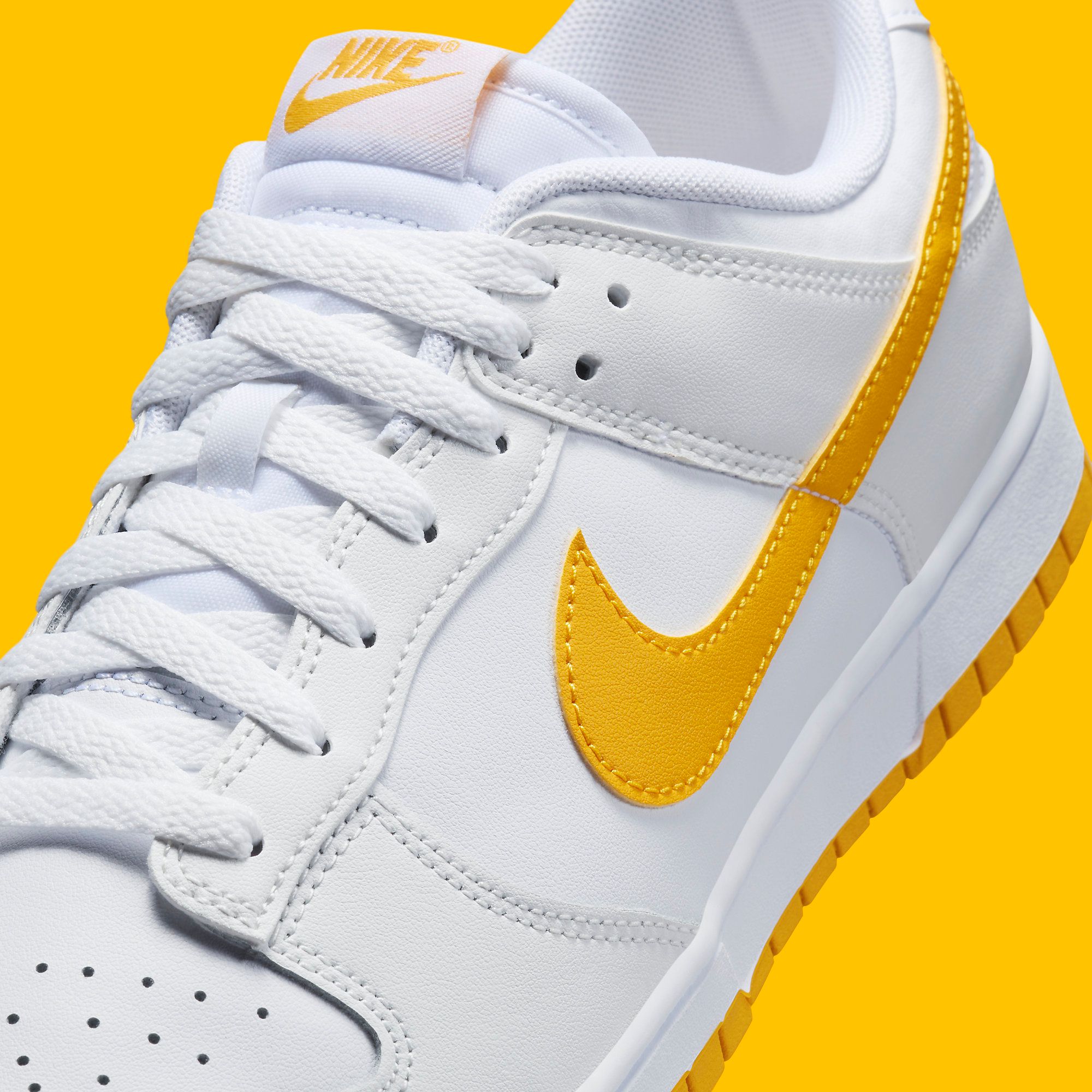 The Nike Dunk Low Appears in White and University Gold | Sb-roscoffShops°