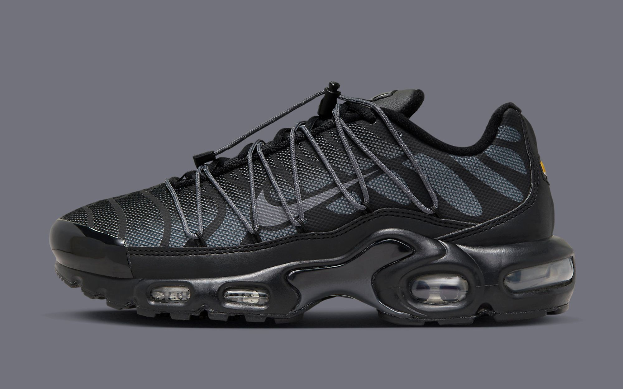 Nike TN Air Max Plus Displays Reflective Uppers In Black And Red