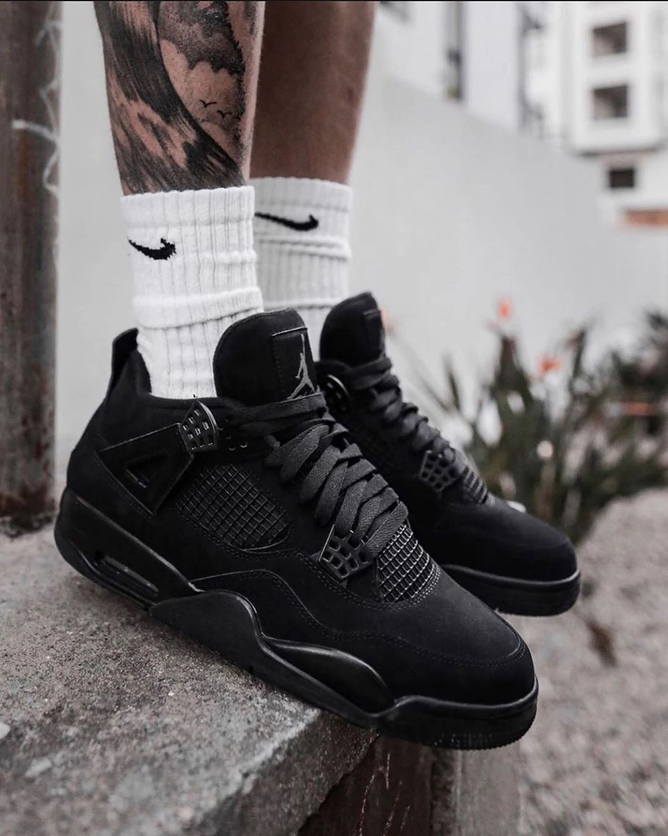 Black cat jordan 4 release date on sale