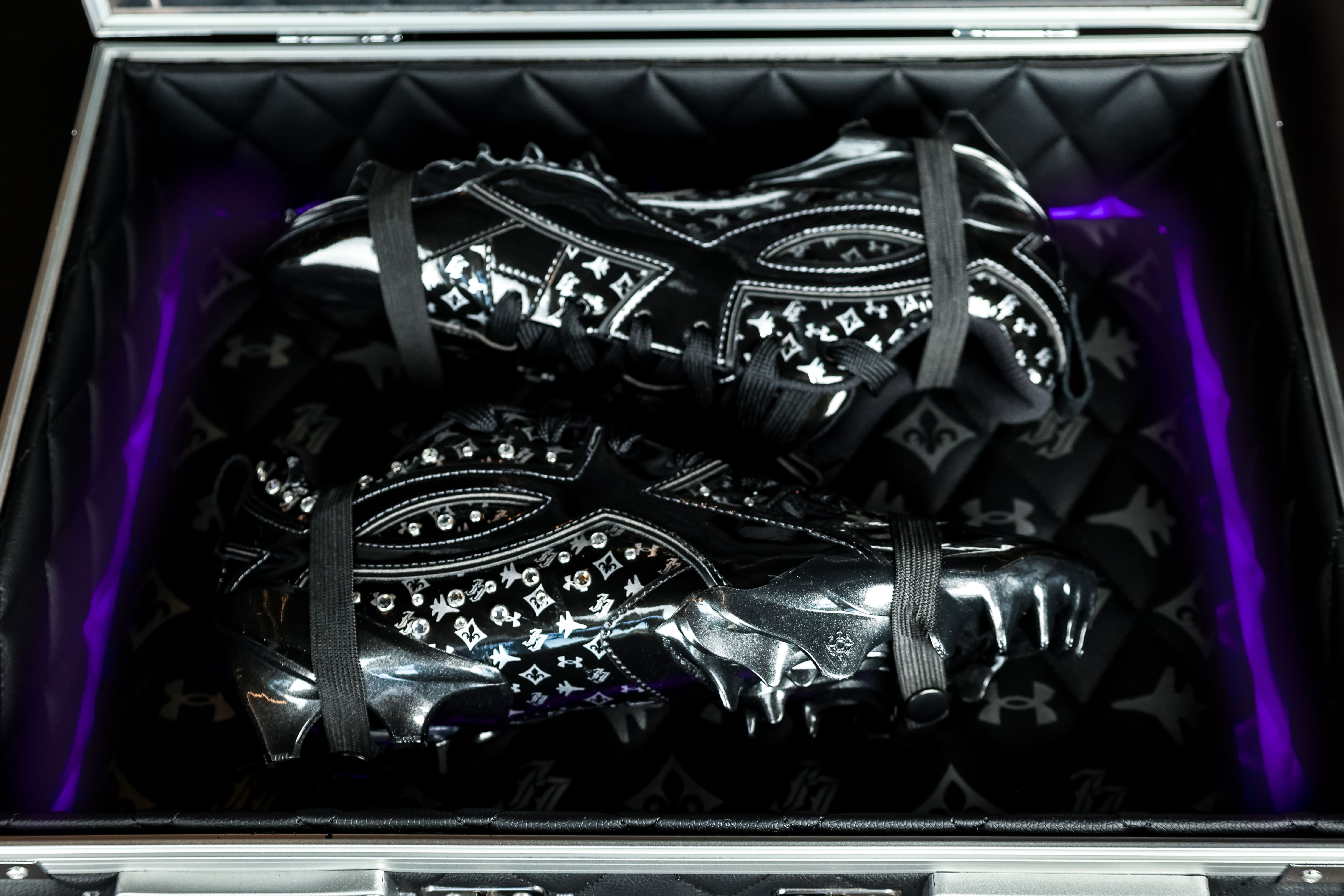 Justin Jefferson x Under Armour "Studded" Cleat in the game day briefcase. 